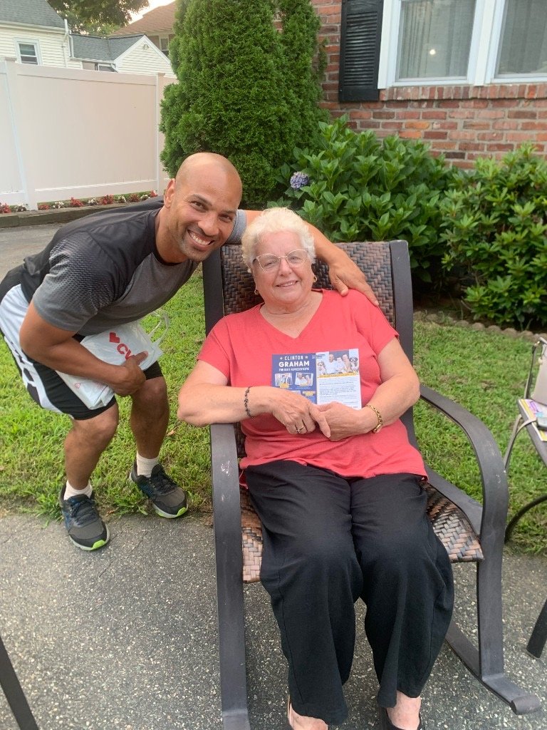 Clinton Graham canvassing with a neighbor